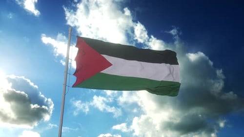 Palestinian National Flag Waving Against a Bright Blue Sky
