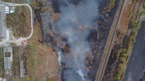 Aerial View of Wildfire Spreading Flames of Forest Fire