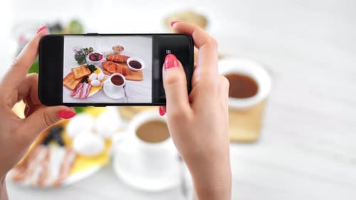 Taking Picture of Breakfast with Smartphone Close Up