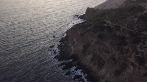 Flight Over Malibu, California View of Beach Shore Line Pacific Ocean at Sunset with