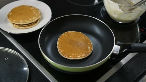 Flipping Delicious Pancake in a Pan
