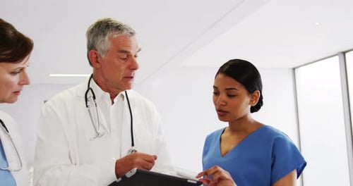 Doctors and Nurses Meeting in Modern Hospital