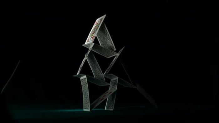 Pyramid house of playing cards falling down, Slow Motion, Slow Motion ...