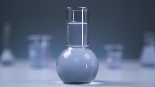 Laboratory Beakers Containing Blue Liquid