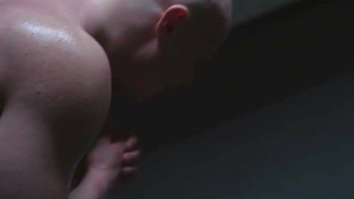 Muscular Adult with Hands Clapsed Together