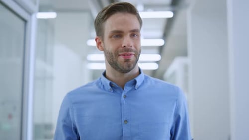 Friendly Businessman Greeting Colleague Office
