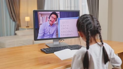 Child Learning Math Online with Remote Tutor