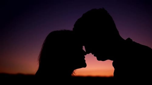 Romantic Couple Silhouette at Sunset