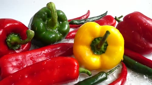 Fresh Peppers Getting Washed With Water