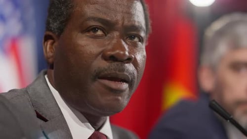 Man Speaks at Formal Corporate Meeting