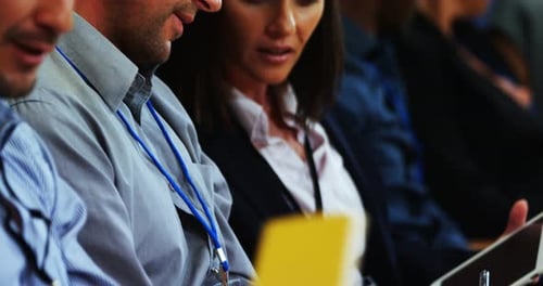 Engaged professionals at a business conference