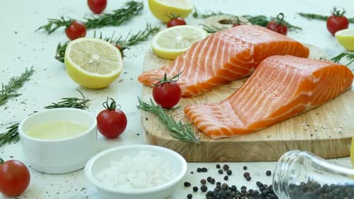 Fresh Salmon Fillets with Ingredients Close Up