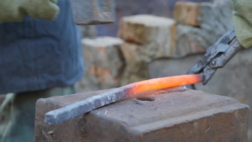 Blacksmith Works on Metal