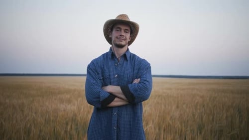Footage Portrait of Young Farmer in the Field.