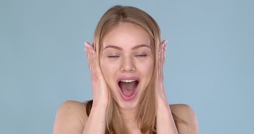 Woman Surprised and Laughing in Close Up