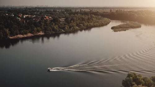 Modern Motor Boat Rides in River Countryside Landscape