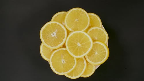 Vibrant Citrus Slices Arranged on Plate