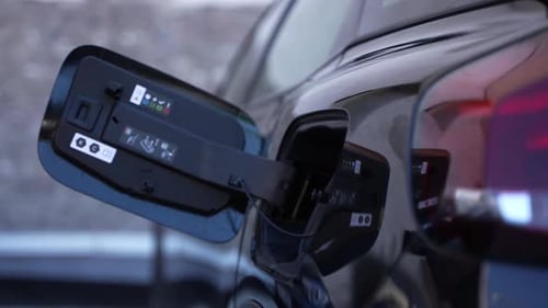 Charging a Modern Black Car 04