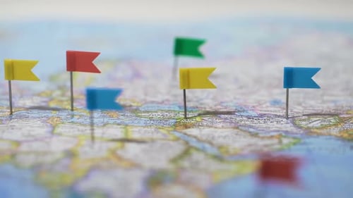 Pin Flags Marking Locations on a World Map