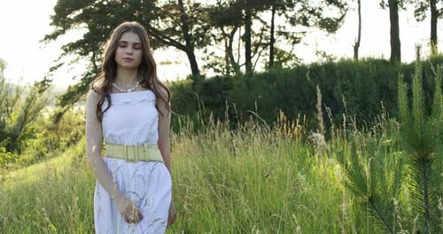 Young Woman in a Summer Meadow