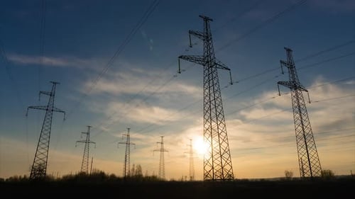 Time lapse Electricity pylons, Power lines. Sunrise sky. Beautiful landscape.