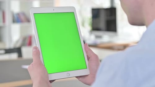 Close Up of Young Man Hand Using Tablet PC