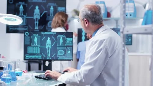 Senior Scientist Analyzing Data in Modern Laboratory