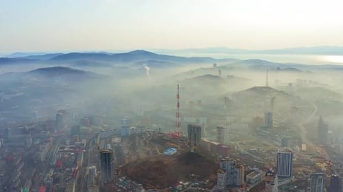 The Mystical Morning City of Vladivostok with Houses Shrouded in Fog