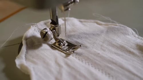 Sewing Machine Stitching White Fabric Close Up