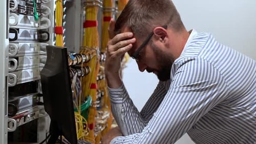 Man Working at Computer Server Data Analysis