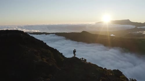 Aerial view of a person standing on the mountain, Reunion.