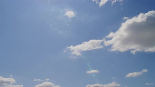 Isolated Clouds Formation Timelapse on a Bright Sunny Summer Day