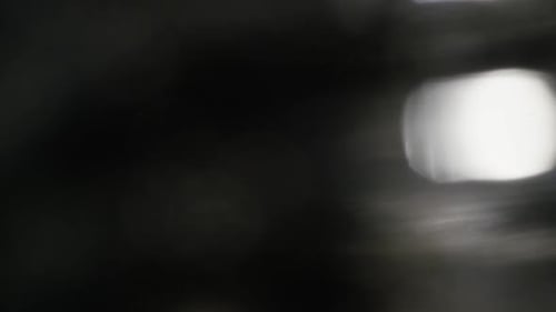 Abstract Blurred Lights Against Dark Background