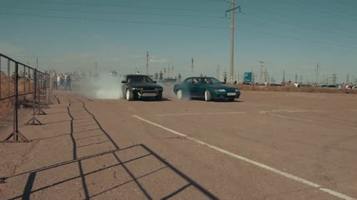 Drifting car, professional driver drifting car on asphalt race track. smoke and dust