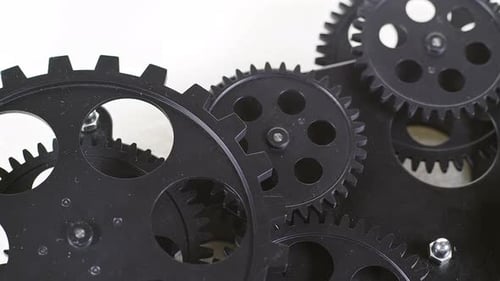 Rotating Interconnected Gears Mechanism Close Up
