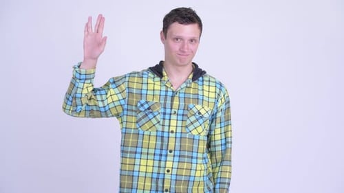 Happy Young Handsome Man Waving Hand