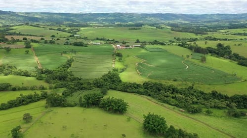 Aerial View of Green Rolling Hills and Farmland