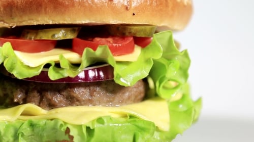 Close Up of a Large Hamburger on White