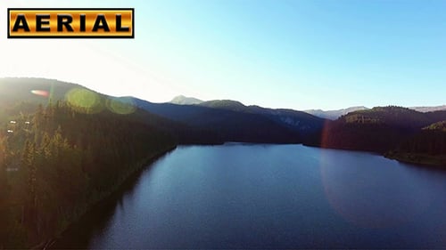 Fly Over Mountain Lake At Sunset