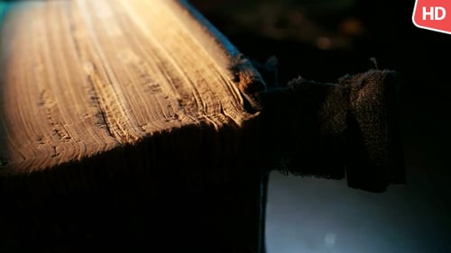 Close Up of Very Old Book in the Dark