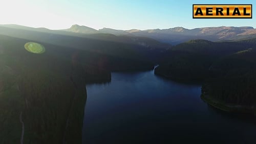 Fly Over Mountain Lake At Sunset