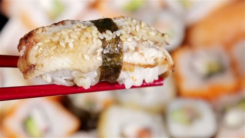 Sushi Close Up With Chopsticks