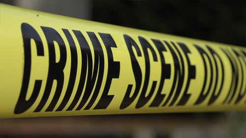 Crime Scene Tape Close Up in Daytime