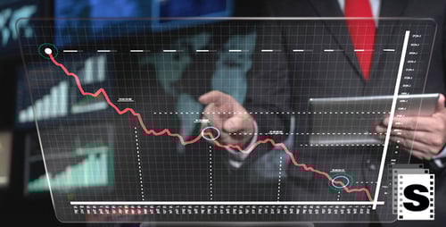 Man Manipulating Data on Transparent Digital Screen