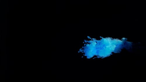 Abstract Blue Ink Flowing in Water with Fluid Motion
