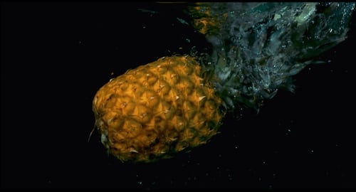 Pineapple In Falling In The Water