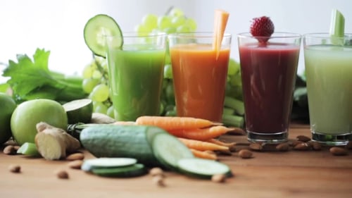 Assorted Fruit Smoothies on Wooden Table