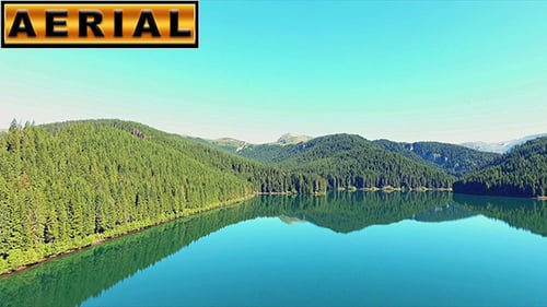 Fly Over Mirror Mountain Lake At Sunrise