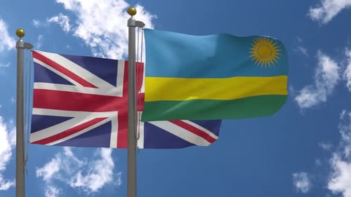 United Kingdom and Rwanda Flags Waving on Flagpoles