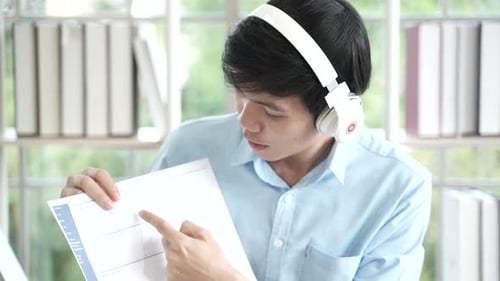Young Adult Presenting Data in Modern Office